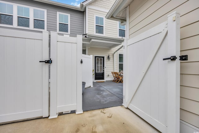 property entrance with a patio