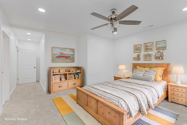 bedroom with ceiling fan, light colored carpet, recessed lighting, visible vents, and baseboards