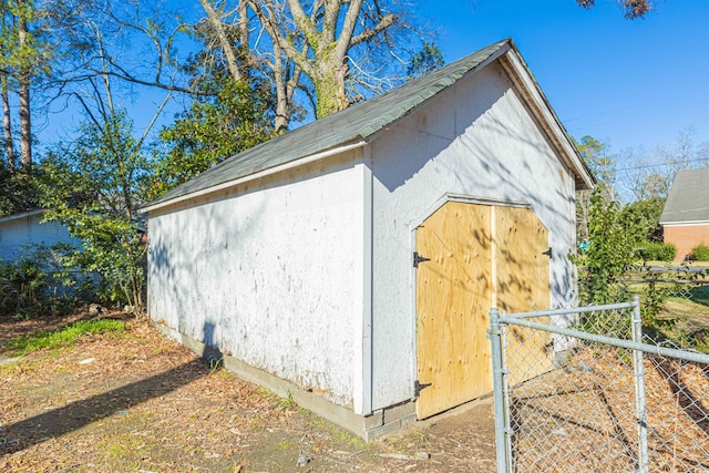 view of outdoor structure with an outdoor structure and fence