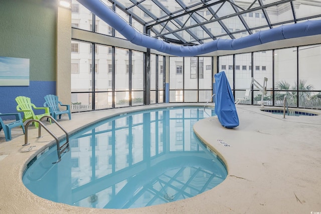 pool with a patio and a lanai