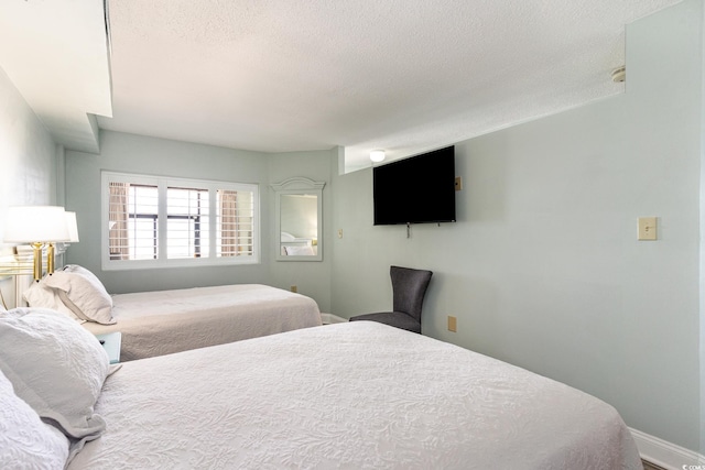 bedroom with a textured ceiling