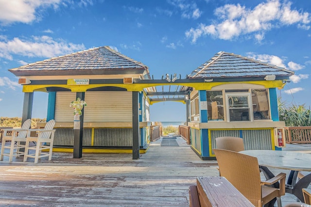 4800 S Ocean Blvd Unit 1514, North Myrtle Beach, SC 29582 - view of community featuring a deck and outdoor dining space