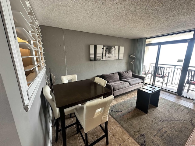 4800 S Ocean Blvd Unit 1514, North Myrtle Beach, SC 29582 - tiled living area with a textured ceiling and a textured wall