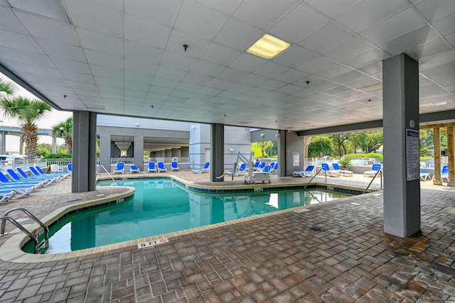 view of swimming pool featuring a patio