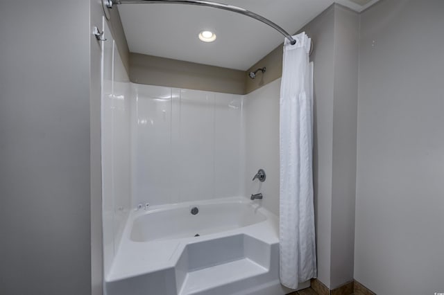 bathroom featuring shower / bath combination with curtain