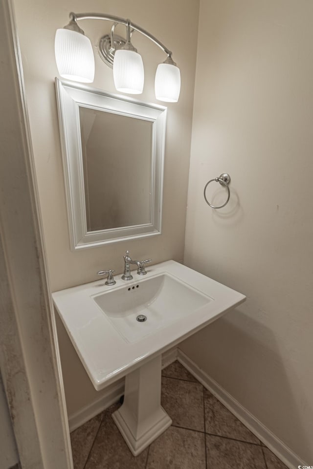 bathroom featuring tile patterned flooring