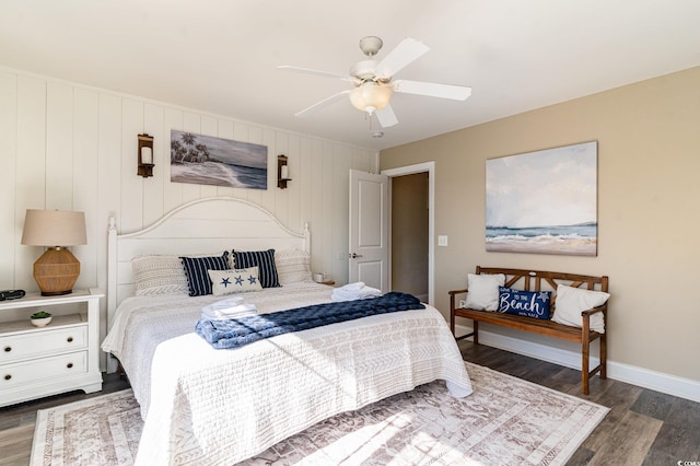 bedroom with dark wood-type flooring and ceiling fan