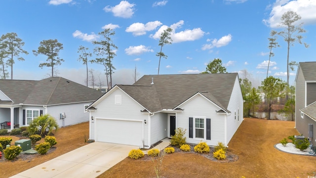 single story home featuring a garage