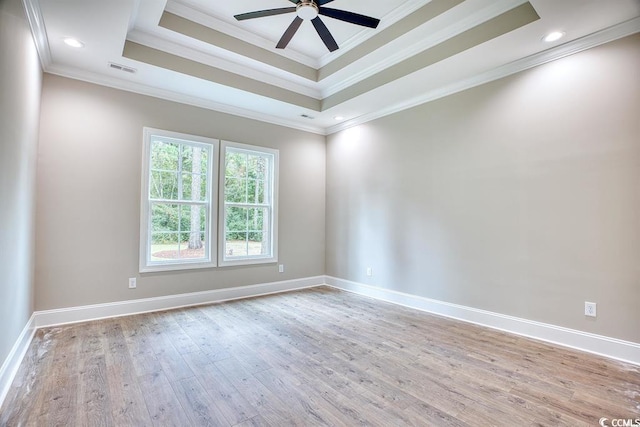 641 Waterbridge Blvd, Myrtle Beach, SC 29579 - unfurnished room with wood finished floors, ceiling fan, crown molding, a raised ceiling, and baseboards