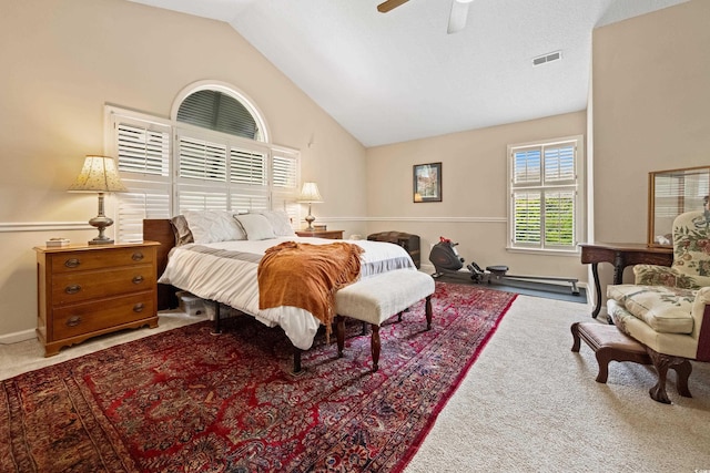 bedroom with vaulted ceiling, carpet flooring, and ceiling fan