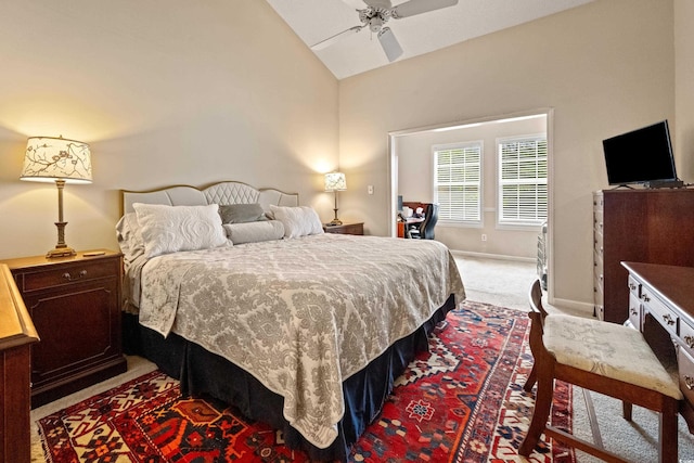 bedroom with carpet floors, vaulted ceiling, and ceiling fan