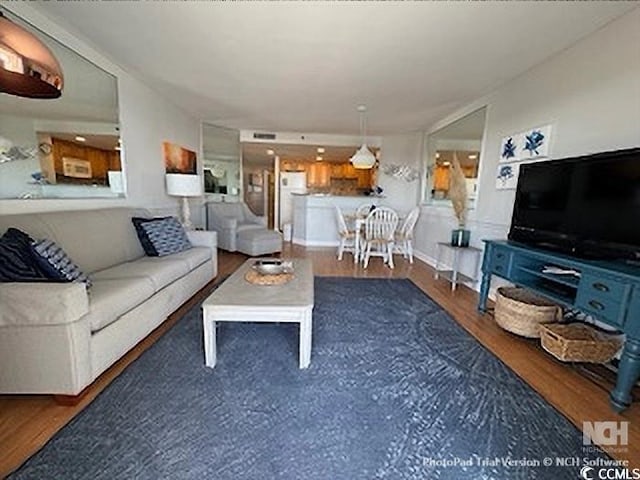 living area with wood finished floors