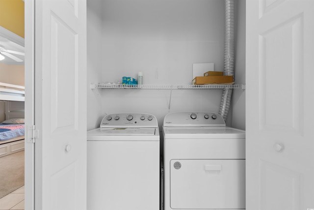 1529 Lanterns Rest Dr Unit 201, Myrtle Beach, SC 29579 - laundry area with independent washer and dryer, ceiling fan, and tile patterned floors