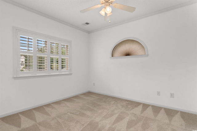 1529 Lanterns Rest Dr Unit 201, Myrtle Beach, SC 29579 - empty room with light carpet, a ceiling fan, crown molding, and baseboards