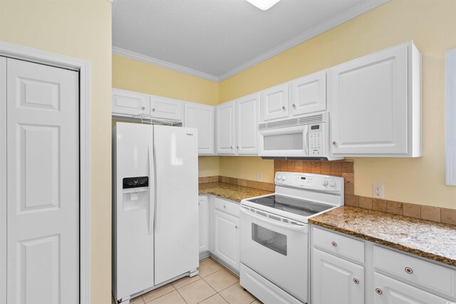 1529 Lanterns Rest Dr Unit 201, Myrtle Beach, SC 29579 - kitchen featuring white appliances, white cabinets, ornamental molding, light stone counters, and light tile patterned floors
