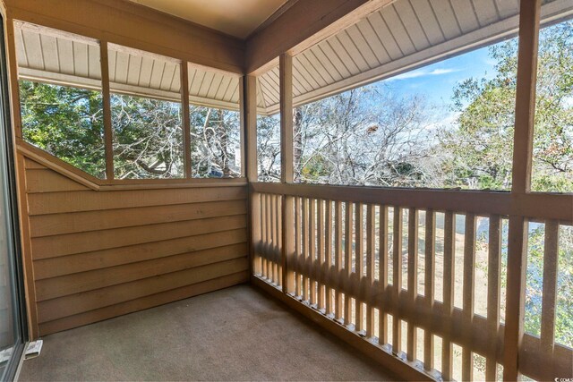 unfurnished sunroom with plenty of natural light