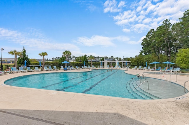 pool with a patio