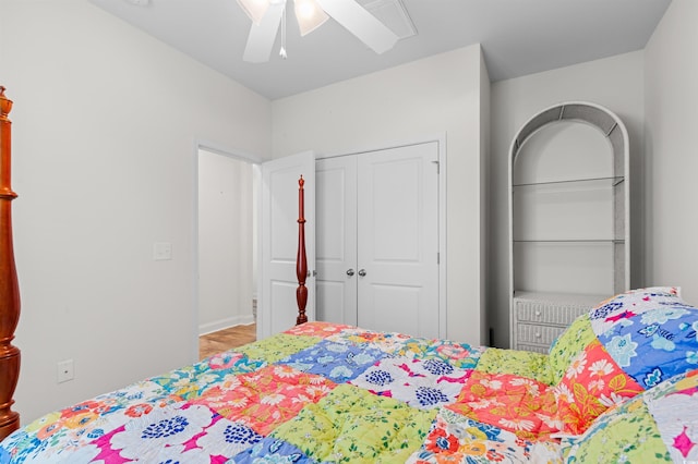 bedroom with ceiling fan and a closet