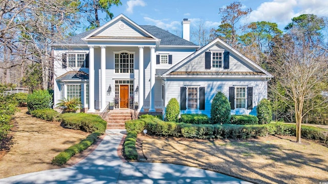 view of greek revival inspired property