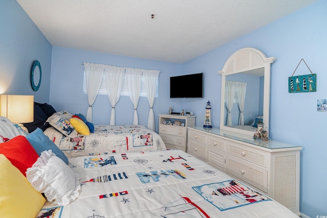 bedroom featuring a textured ceiling