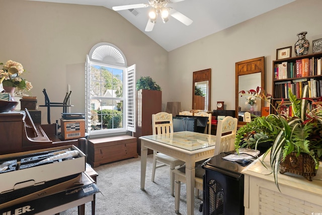 office space featuring light carpet, lofted ceiling, and ceiling fan