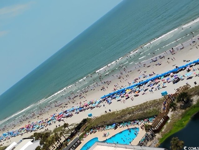 bird's eye view with a beach view and a water view