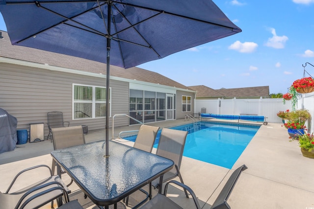 view of swimming pool featuring a patio