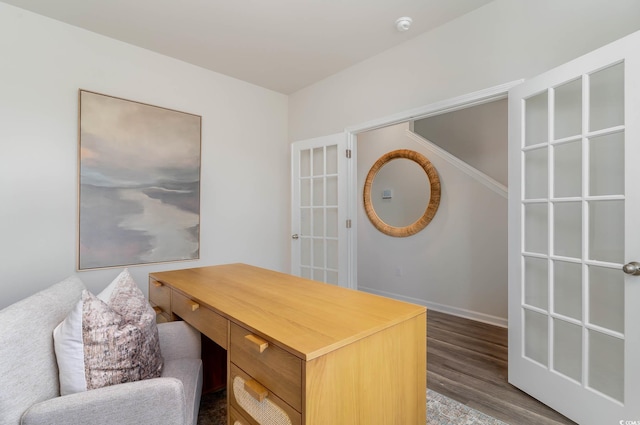 office space with french doors, baseboards, and dark wood finished floors