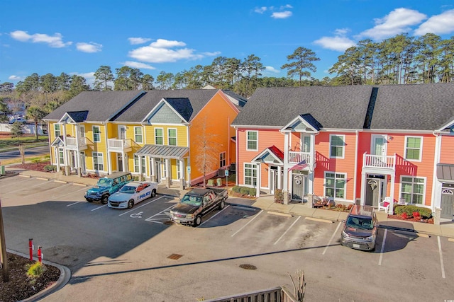 763 Moen Pl Unit 763-A, Myrtle Beach, SC 29577 - rear view of house with uncovered parking and a residential view