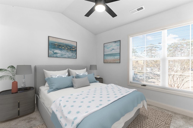 763 Moen Pl Unit 763-A, Myrtle Beach, SC 29577 - bedroom featuring light carpet, multiple windows, lofted ceiling, baseboards, and a ceiling fan