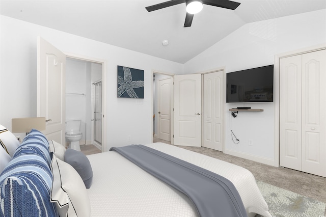 763 Moen Pl Unit 763-A, Myrtle Beach, SC 29577 - bedroom featuring two closets, vaulted ceiling, carpet flooring, baseboards, and ensuite bath