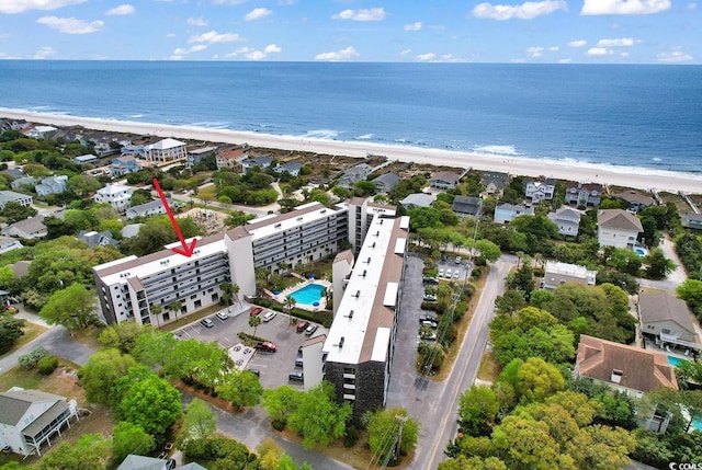 bird's eye view featuring a beach view and a water view