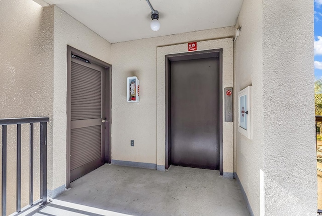 property entrance featuring elevator