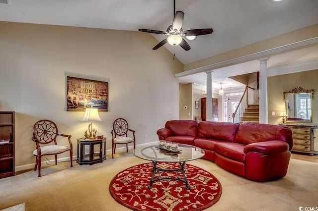 living room with ceiling fan, ornate columns, light colored carpet, and lofted ceiling