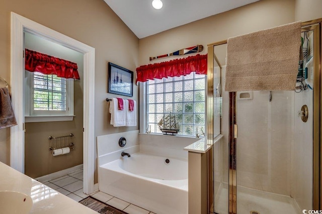 bathroom featuring tile patterned floors and plus walk in shower