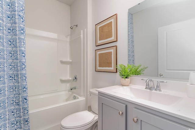 full bathroom featuring toilet, vanity, and shower / bathtub combination with curtain