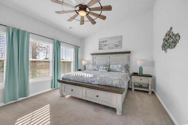 bedroom featuring baseboards, visible vents, lofted ceiling, ceiling fan, and light carpet