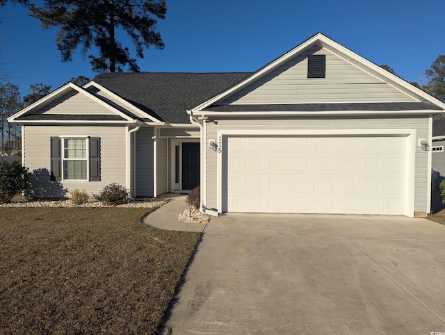 ranch-style house with concrete driveway, a front lawn, and an attached garage