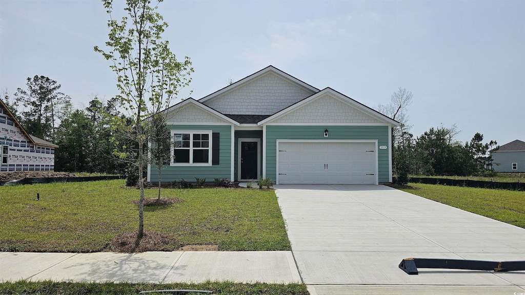 2878 Riverboat Way, Conway, SC 29526 - view of front of home with a front yard and a garage