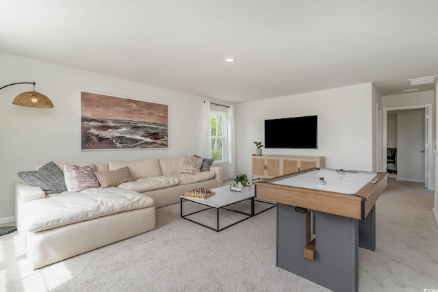 living area featuring recessed lighting, light colored carpet, visible vents, and baseboards