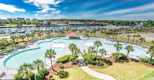 6015 Catalina Dr Unit 734, North Myrtle Beach, SC 29582 - drone / aerial view of a large body of water, a pool, and numerous boat docks