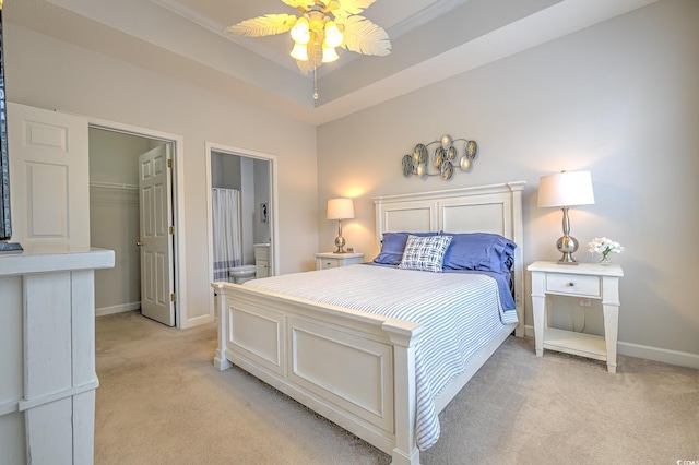 6015 Catalina Dr Unit 734, North Myrtle Beach, SC 29582 - bedroom with light carpet, baseboards, ensuite bathroom, a spacious closet, and a closet