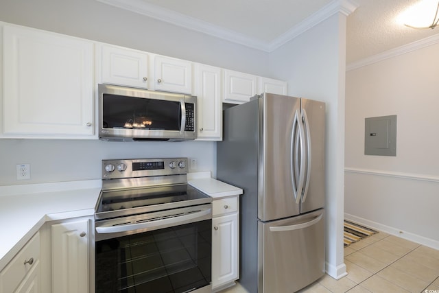 6015 Catalina Dr Unit 734, North Myrtle Beach, SC 29582 - kitchen featuring stainless steel appliances, electric panel, light countertops, white cabinets, and ornamental molding