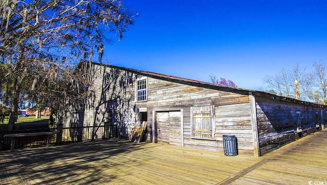 view of outbuilding featuring a garage