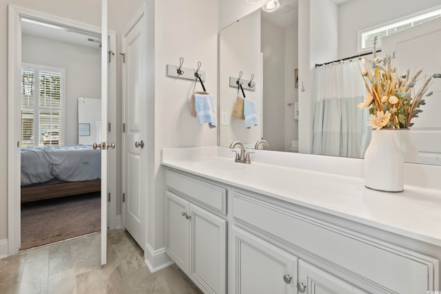 bathroom featuring vanity and a healthy amount of sunlight