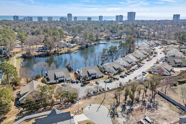 bird's eye view with a water view