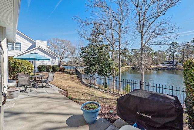 118 Gully Branch Ln Unit 3, Myrtle Beach, SC 29572 - view of patio featuring a water view, a fenced backyard, and area for grilling