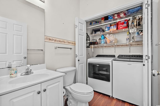 118 Gully Branch Ln Unit 3, Myrtle Beach, SC 29572 - half bath with toilet, washer / clothes dryer, wood finished floors, and vanity