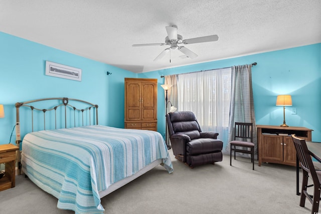 118 Gully Branch Ln Unit 3, Myrtle Beach, SC 29572 - bedroom with light carpet, ceiling fan, and a textured ceiling