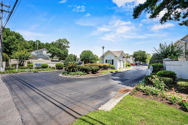 118 Gully Branch Ln Unit 3, Myrtle Beach, SC 29572 - view of road with street lights, curbs, and a residential view